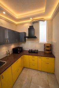 Kitchen Image of 1200 Sq.ft 3 BHK Builder Floor for rent in Sahastradhara Road Dehradun for Rs. 35000