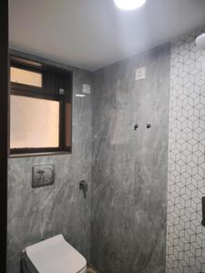 Common Bathroom One Image of 710 Sq.ft 1 BHK Apartment / Flat for rent in Haware Dahlia Bldg A D And E, Kasarvadavali Thane for Rs. 17002