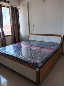 Bedroom Image of 1150 Sq.ft 2 BHK Apartment / Flat for rent in Aawaass River Front, Randesan Gandhinagar for Rs. 20000