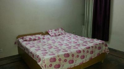 Bedroom Image of Dharam Girls  PG  in Phase 2, Noida