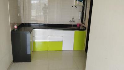 Kitchen Image of 900 Sq.ft 1 BHK Apartment / Flat for rent in Ravinanda Skylights, Wagholi Pune for Rs. 16000