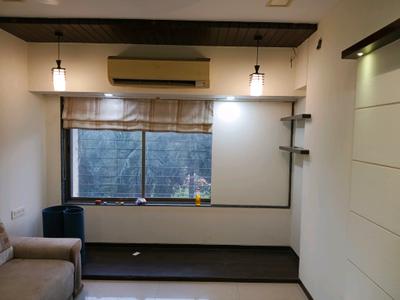 Living Room Image of 954 Sq.ft 2 BHK Apartment / Flat for rent in Ajmera Bhakti Park, Wadala East Mumbai for Rs. 75000