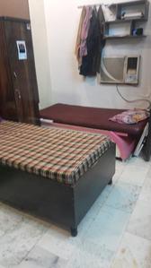 Bedroom Image of Sri Balaji PG in Jhilmil Colony, New Delhi