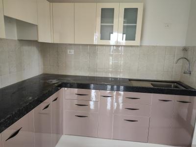 Kitchen Image of 900 Sq.ft 2 BHK Apartment / Flat for rent in Shapoorji Pallonji Joyville Sensorium, Maan Pune for Rs. 26000