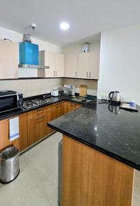 Kitchen Image of 930 Sq.ft 1 BHK Apartment / Flat for sale in Central Park The Room, Sector 48 Gurgaon for Rs. 28000000