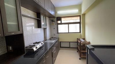Kitchen Image of 575 Sq.ft 1 BHK Apartment / Flat for rent in Ajmera Bhakti Park, Wadala East Mumbai for Rs. 47000