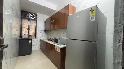 Kitchen Image of 1200 Sq.ft 1 BHK Builder Floor for rent in DLF Phase 1 Gurgaon for Rs. 38000