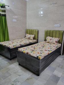Bedroom Image of Pg for girls in New Industrial Township, Faridabad
