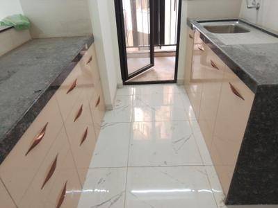 Kitchen Image of 900 Sq.ft 2 BHK Apartment / Flat for rent in Mahindra Nestalgia, Pimpri Pune for Rs. 34500