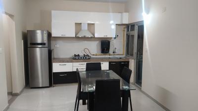 Kitchen Image of 1350 Sq.ft 3 BHK Apartment / Flat for rent in Adani The Meadows, Shantigram Ahmedabad for Rs. 42000