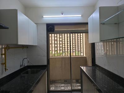 Kitchen Image of 1050 Sq.ft 2 BHK Apartment / Flat for sale in Alpinepeak Seasons, Naigaon East Naigaon for Rs. 5450000