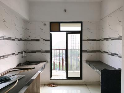 Kitchen Image of 555 Sq.ft 1 BHK Apartment / Flat for sale in Dynamic Crest Phase I Rimo Everest, Khidkali Thane for Rs. 4200000