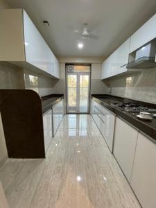 Kitchen Image of 1100 Sq.ft 2 BHK Apartment / Flat for sale in SMGK Woods Platina Wing B Ebony Tower, Jogeshwari West Mumbai for Rs. 25000000