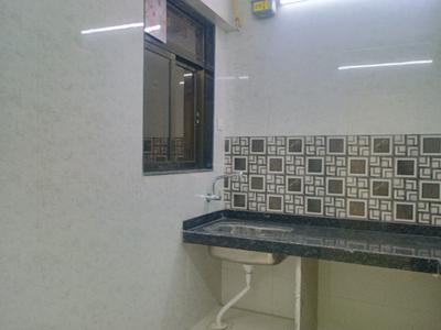 Kitchen Image of 850 Sq.ft 2 BHK Apartment / Flat for sale in Tharwani Vedant Millenia Happiness Phase II Wing B, Titwala Thane for Rs. 4500000