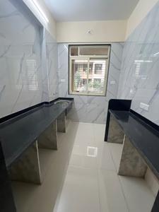 Kitchen Image of 990 Sq.ft 2 BHK Apartment / Flat for sale in Mohan Willows III, Badlapur East Badlapur for Rs. 4000000