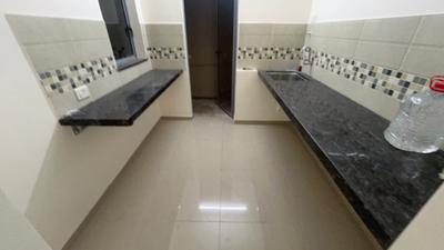 Kitchen Image of 790 Sq.ft 2 BHK Apartment / Flat for rent in Mahindra Happinest Tathawade, Tathawade Pune for Rs. 24500