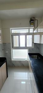 Kitchen Image of 665 Sq.ft 2 BHK Apartment / Flat for rent in Wadhwa Atmosphere, Mulund West Mumbai for Rs. 57000