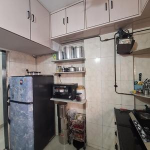Kitchen Image of 600 Sq.ft 2 BHK Apartment / Flat for sale in Kashish Park, Dharamveer Nagar Thane for Rs. 10000000
