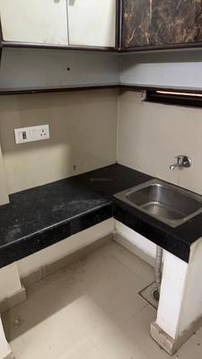 Kitchen Image of 270 Sq.ft 1 RK Apartment / Flat for rent in DLF Phase 3 Gurgaon for Rs. 13500
