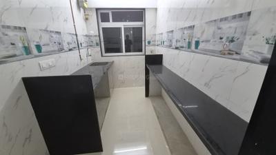 Kitchen Image of 620 Sq.ft 1.5 BHK Apartment / Flat for sale in Shree Jyotsna Heritage Redevelopment Of The Dahisar R K Nayak Niwasi CHS LTD, Tokare Virar for Rs. 13200000