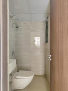Common Bathroom Image of 600 Sq.ft 1 BHK Apartment / Flat for sale in Sunteck World, Naigaon East Naigaon for Rs. 4000000