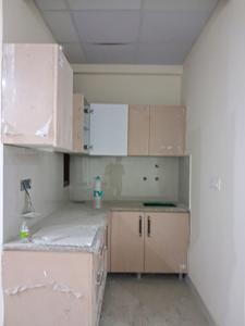 Kitchen Image of 625 Sq.ft 1 BHK Apartment / Flat for sale in GCM Gomati Apartment, Sector 49 Noida for Rs. 2600000
