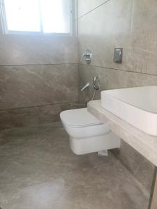 Common Bathroom Image of 1660 Sq.ft 3 BHK Apartment / Flat for sale in Kharghar Navi Mumbai for Rs. 27500000