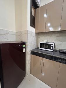 Kitchen Image of 690 Sq.ft 1 BHK Builder Floor for rent in DLF Independent Floors, DLF Phase 3 Gurgaon for Rs. 30000