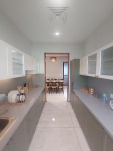 Kitchen Image of 1955 Sq.ft 4 BHK Apartment / Flat for sale in Tigers Nest, Bhugaon Pune for Rs. 15700000