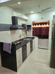 Kitchen Image of 1000 Sq.ft 2 BHK Apartment / Flat for rent in Aawaass River Front, Randesan Gandhinagar for Rs. 28000