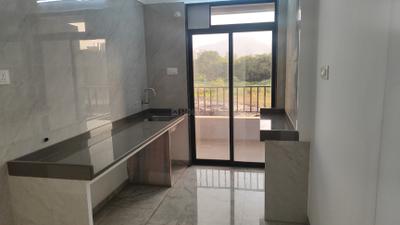 Kitchen Image of 1050 Sq.ft 2 BHK Apartment / Flat for sale in Rudis Shivalaya Heights, Khidkali Thane for Rs. 6000000