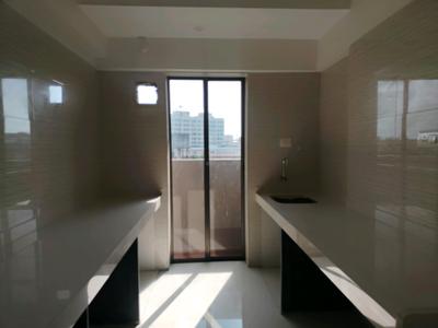 Kitchen Image of 1056 Sq.ft 2 BHK Apartment / Flat for sale in Rajhans Moonstone, Vasai West Vasai for Rs. 12500000