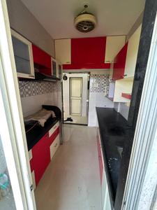 Kitchen Image of 910 Sq.ft 2 BHK Apartment / Flat for sale in Thakurli Thane for Rs. 7199000