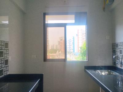 Kitchen Image of 730 Sq.ft 1 BHK Apartment / Flat for sale in Nisarg Greens, Ambernath East Ambernath for Rs. 3899000