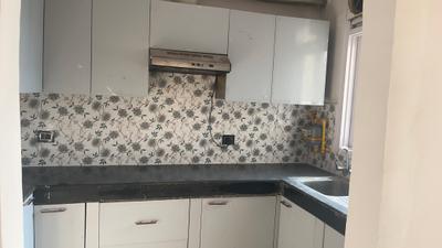 Kitchen Image of 1415 Sq.ft 3 BHK Apartment / Flat for sale in Mapsko Krishna Apra Gardens, Indirapuram Ghaziabad for Rs. 17800000