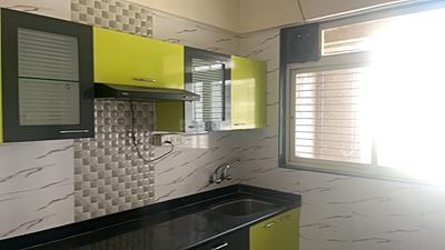 Kitchen Image of 770 Sq.ft 1 BHK Apartment / Flat for rent in Mohan Willows II, Badlapur East Badlapur for Rs. 8500