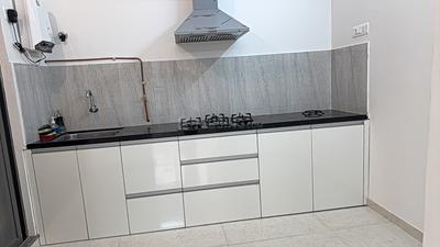 Kitchen Image of 890 Sq.ft 2 BHK Apartment / Flat for rent in Manhattan, Charholi Budruk Pune for Rs. 25000