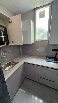 Kitchen Image of 580 Sq.ft 1 RK Builder Floor for rent in Greenwood Signatute Suites, Sector 46 Gurgaon for Rs. 23000
