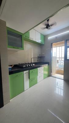 Kitchen Image of 585 Sq.ft 1 BHK Apartment / Flat for rent in Cosmos Jewels, Thane West Thane for Rs. 25000