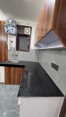 Kitchen Image of 450 Sq.ft 1 BHK Apartment / Flat for rent in Chhattarpur New Delhi for Rs. 19000