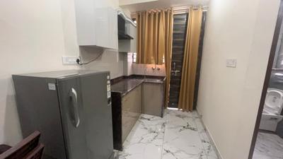 Kitchen Image of 1000 Sq.ft 1 BHK Builder Floor for rent in Sector 57 Gurgaon for Rs. 36000