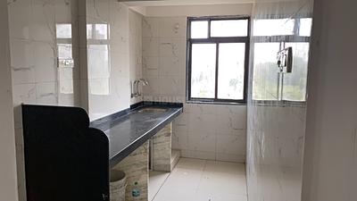 Kitchen Image of 550 Sq.ft 1 BHK Apartment / Flat for sale in Laxmi Aangan Mahanadi Krishna And Ganga, Diva Thane for Rs. 3000000