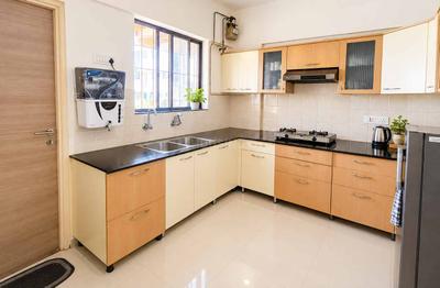 Kitchen Image of Omega Paradise Apartment - Wakad in Wakad, Pune