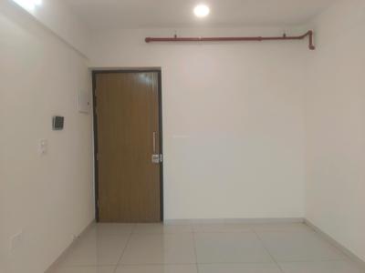 Living Room Image of 630 Sq.ft 1 BHK Apartment / Flat for sale in Godrej Nest, Kandivali East Mumbai for Rs. 12700000