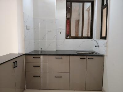 Kitchen Image of 715 Sq.ft 1 BHK Apartment / Flat for sale in Codename Upvan, Kharghar Navi Mumbai for Rs. 4500000