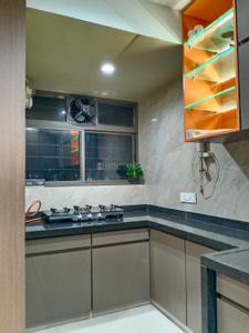 Kitchen Image of 1300 Sq.ft 2 BHK Apartment / Flat for sale in Vesu Surat for Rs. 6500000