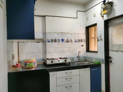 Kitchen Image of 600 Sq.ft 1 BHK Apartment / Flat for sale in Puraniks Kanchan Pushp Society, Kasarvadavali Thane for Rs. 5700000