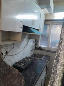Kitchen Image of 400 Sq.ft 1 RK Builder Floor for rent in DLF Capital Greens, Karampura New Delhi for Rs. 23000