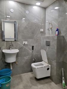 Common Bathroom Image of 1150 Sq.ft 4 BHK Apartment / Flat for sale in Dwarka Mor New Delhi for Rs. 10000000