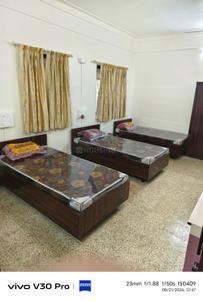 Bedroom Image of Saffron Girls PG in Shivaji Nagar, Pune